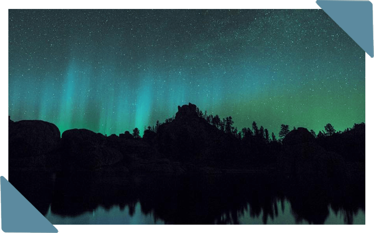 A photo of the Northern Lights and a beautiful night sky.